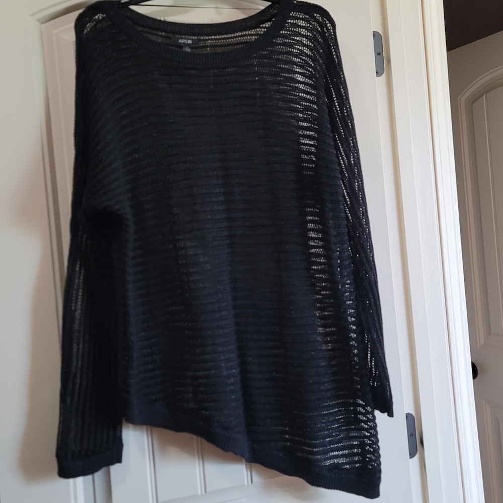 Sheer, see-through sweater.